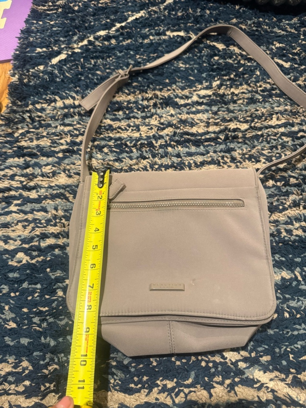 Rare Kenneth Cole Reaction-A grey water resistant saddle/shoulder/cross body